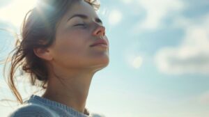 Woman standing outside, taking a deep breath